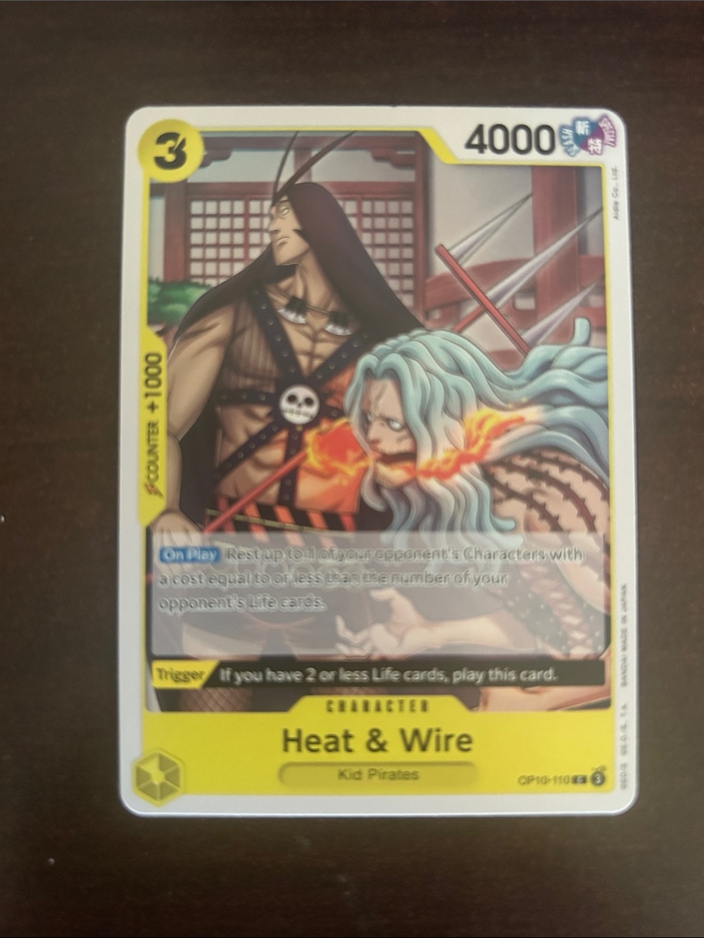 Onepiece Trading Card — Yellow, Black, Blue Artwork (Heat & Wire)
